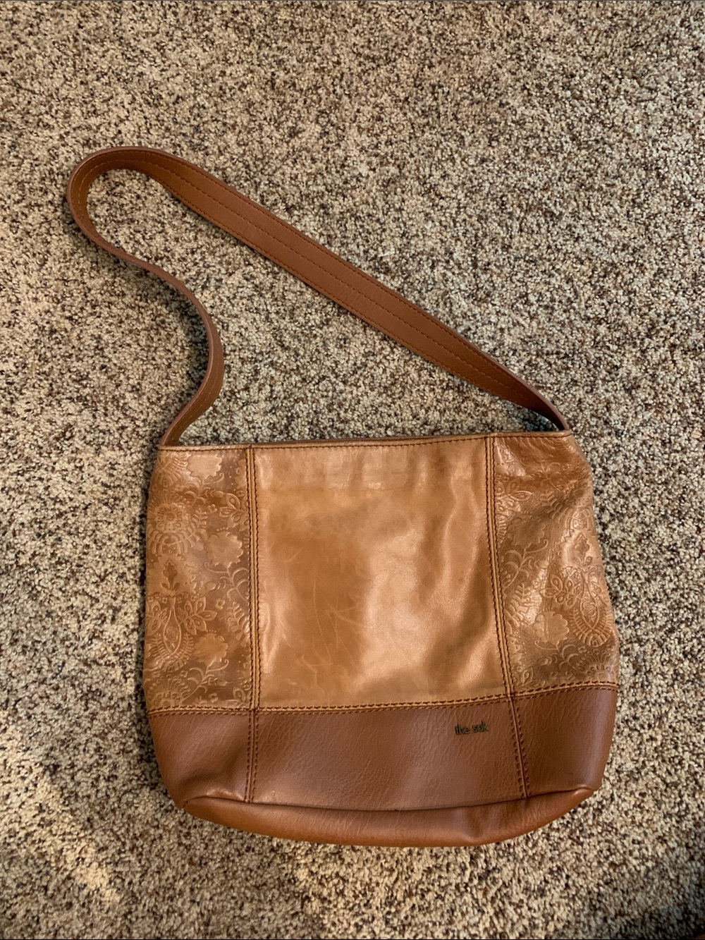 The Sak tan leather shoulder bag with embossed side panels